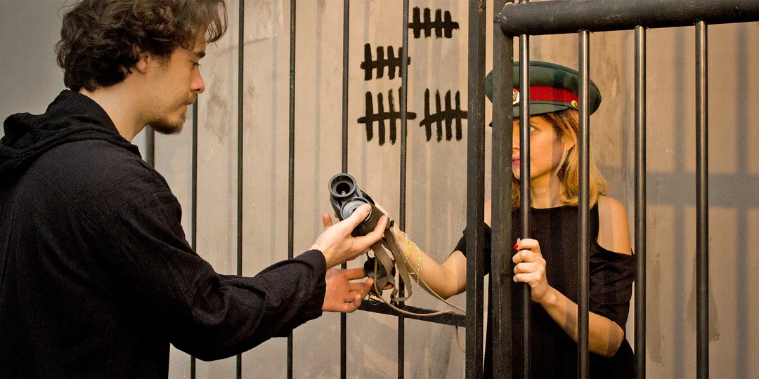 A woman in a prison cell